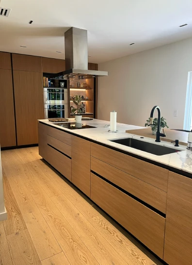 Sleek kitchen interior from a project by Adrian Price (Founder and lead architect at PAStudio in Florida)